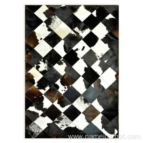 Cowhide black and white leather center area rug